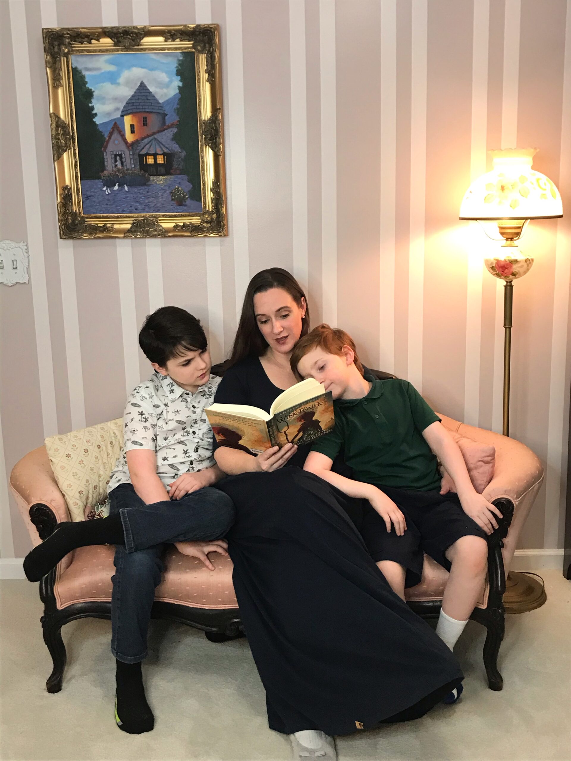 mother reading to children for homeschool 